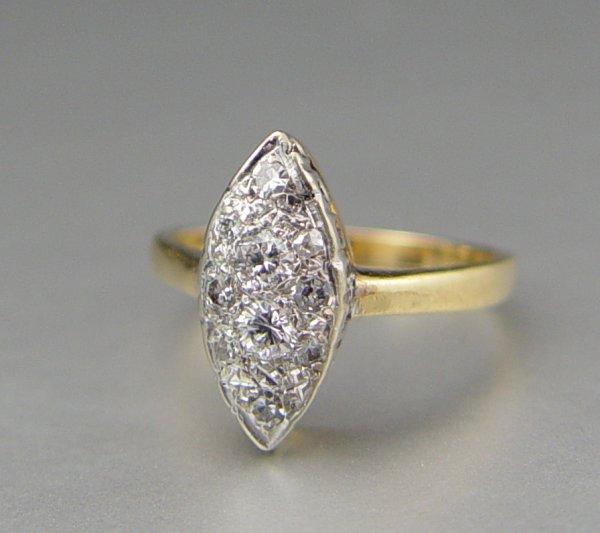 Appraisal: EDWARDIAN DIAMOND RING K yellow gold ring contains two round