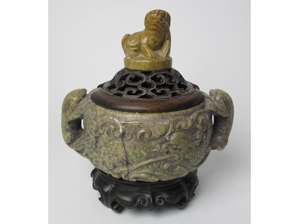 Appraisal: A Chinese hardstone censer carved with grotesques and pierced beast