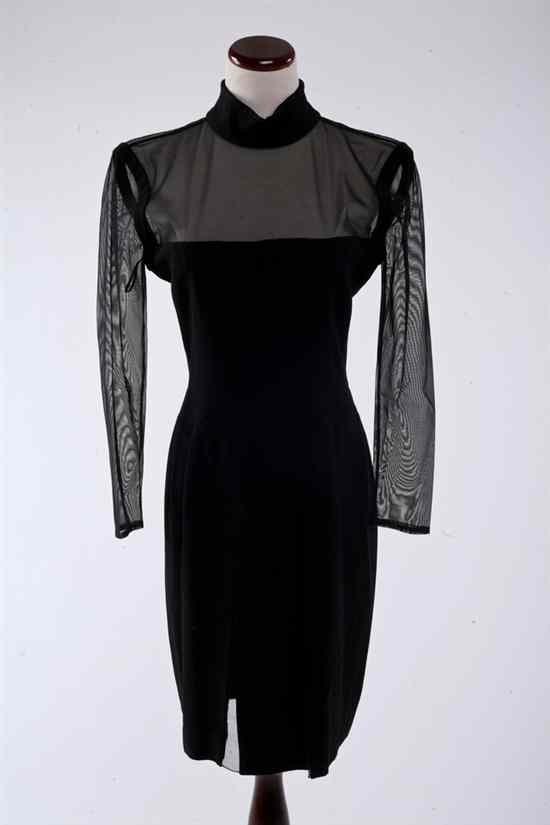 Appraisal: CHRISTIAN DIOR BLACK COCKTAIL DRESS Size Mock turtleneck dress with