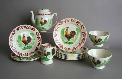 Appraisal: Ten stick spatter plates with rooster decoration together with a