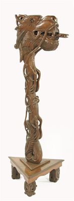 Appraisal: An Eastern carved wood standard lamp modelled as a dragon