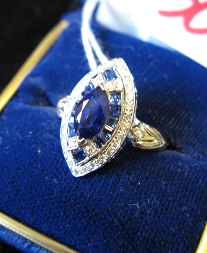 Appraisal: SAPPHIRE DIAMOND AND EIGHTEEN KARAT WHITE GOLD RING sapphires and