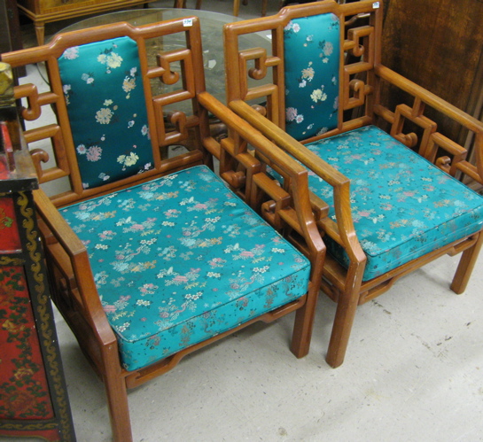 Appraisal: PAIR OF TEAKWOOD ARMCHAIRS Chinese th century with matching padded