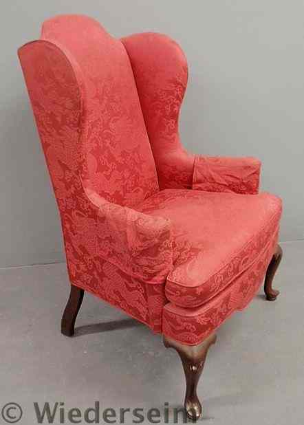 Appraisal: Queen Anne style red wing chair h x w x