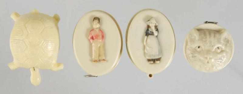 Appraisal: Lot of Celluloid Figural Sewing Tape Measures Description Includes one