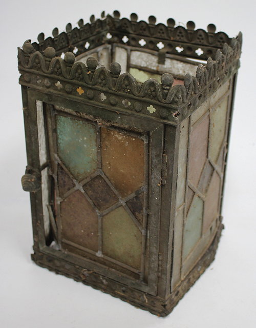 Appraisal: A VICTORIAN SQUARE SECTION PRESSED BRASS LANTERN with leaded glass