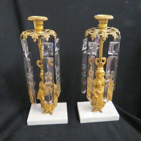 Appraisal: Pair of Figural Brass Candlesticks long glass prisms Girondahl style