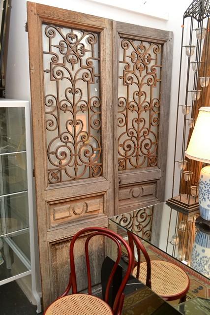 Appraisal: A PAIR OF RUSTIC OAK AND WROUGHT IRON FRENCH DOORS