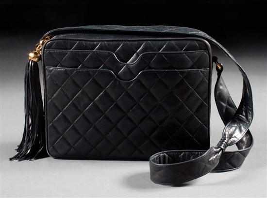 Appraisal: Chanel black leather quilted purse with leather shoulder strap circa