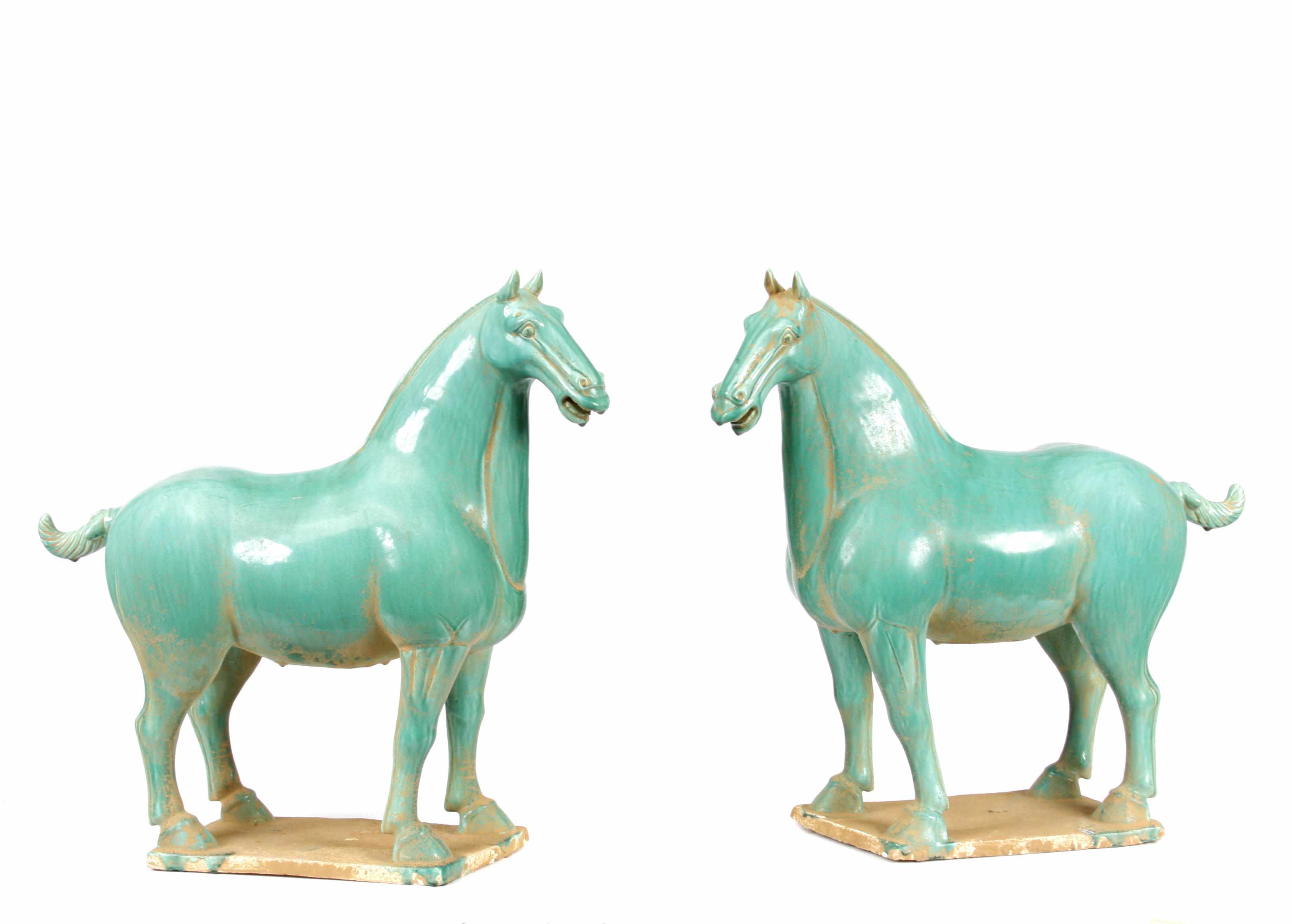 Appraisal: A pair of Chinese Tang style blue glazed horses height