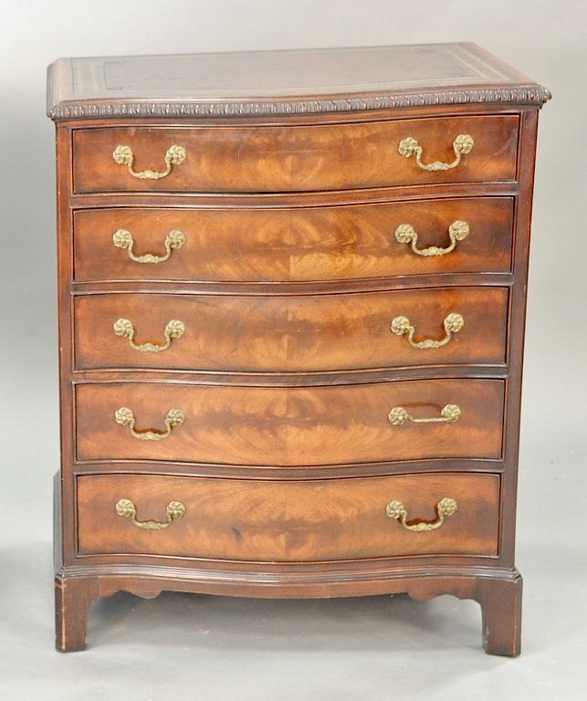 Appraisal: Chippendale style diminutive serpentine chest with leather top ht in