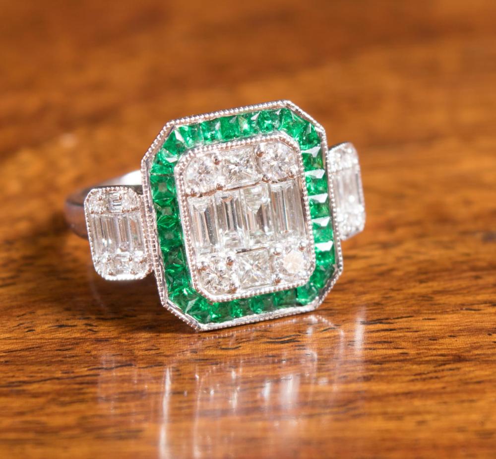 Appraisal: DIAMOND EMERALD AND EIGHTEEN KARAT GOLD RING The k white