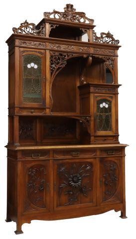 Appraisal: Art Nouveau walnut sideboard c carved and pierced crest with