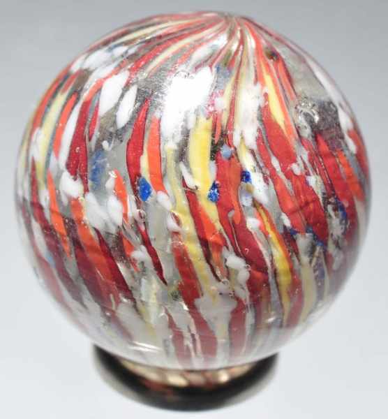 Appraisal: Left Twist Speckled Onionskin Marble Description Translucent base Left twist