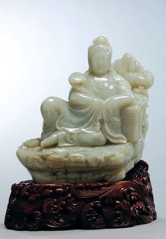 Appraisal: MASSIVE WHITE JADE GUANYIN Finely carved and massive Chinese white