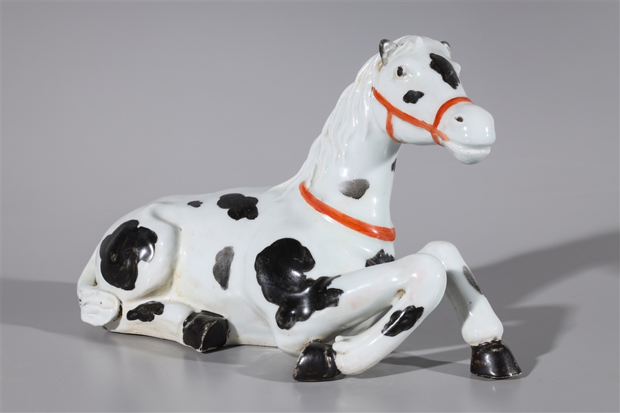 Appraisal: Chinese enameled porcelain horse statue with spot design some wear