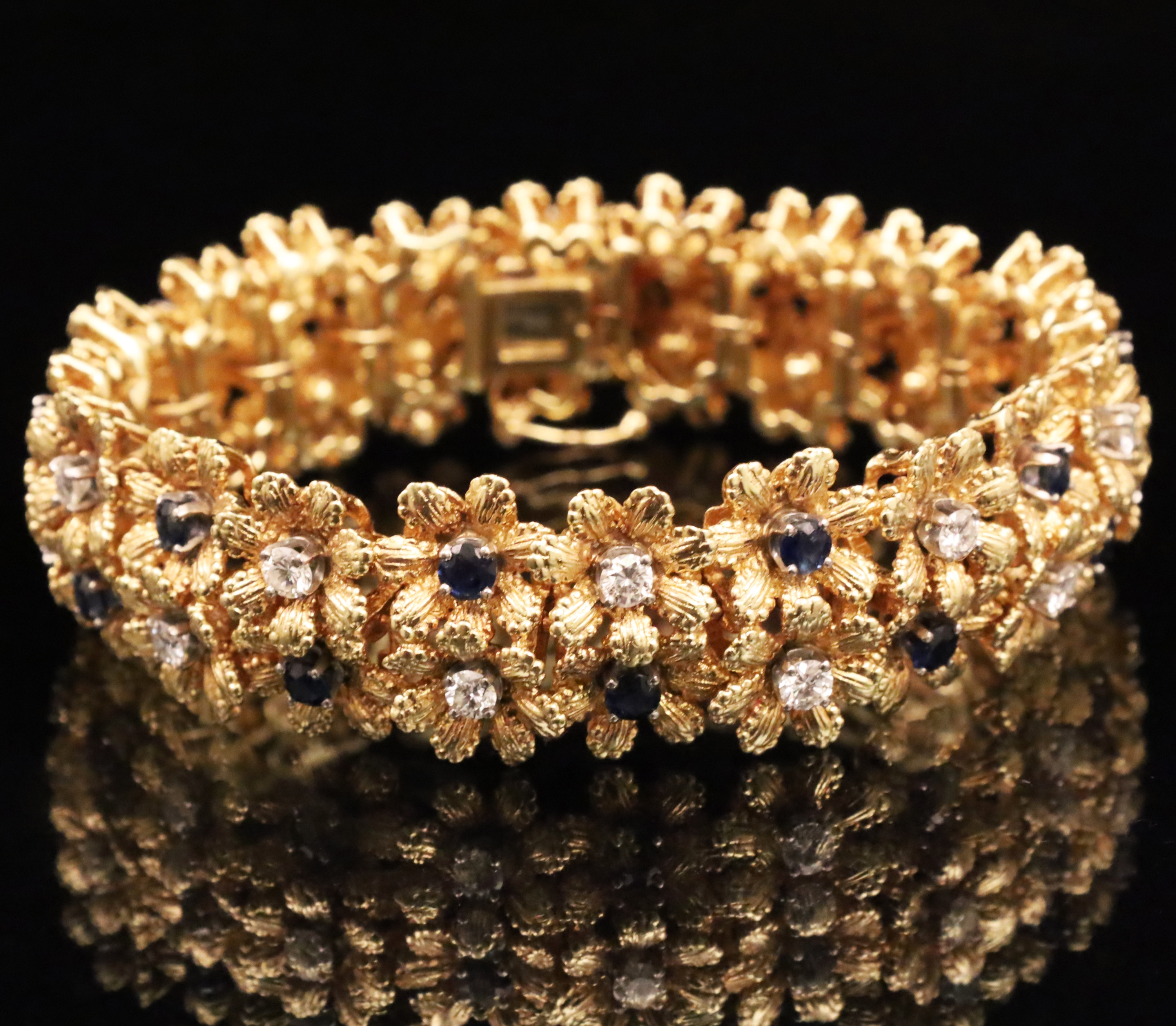 Appraisal: K YG DIAMOND AND SAPPHIRE BRACELET K yellow gold diamond