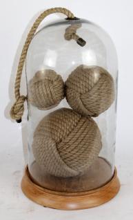 Appraisal: Nautical rope balls in glass dome display Nautical rope balls