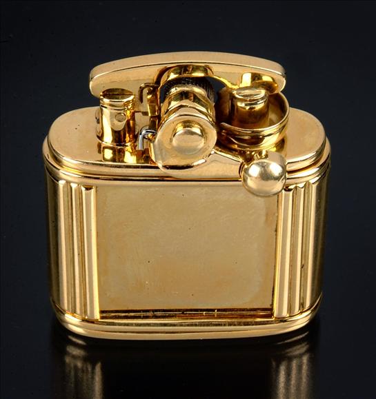 Appraisal: An carat gold oblong section lighter by Dianoor Jewels Ltd