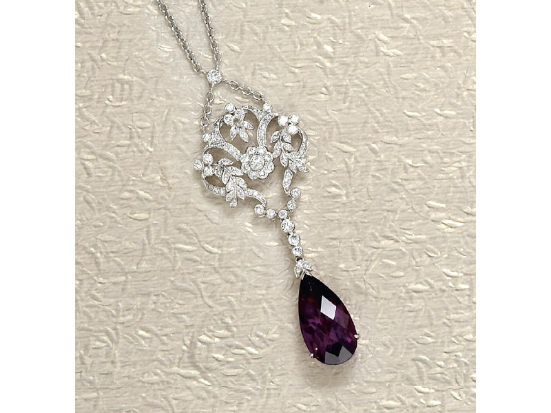 Appraisal: AMETHYST AND DIAMOND NECKLACE An k white gold lavaliere necklace