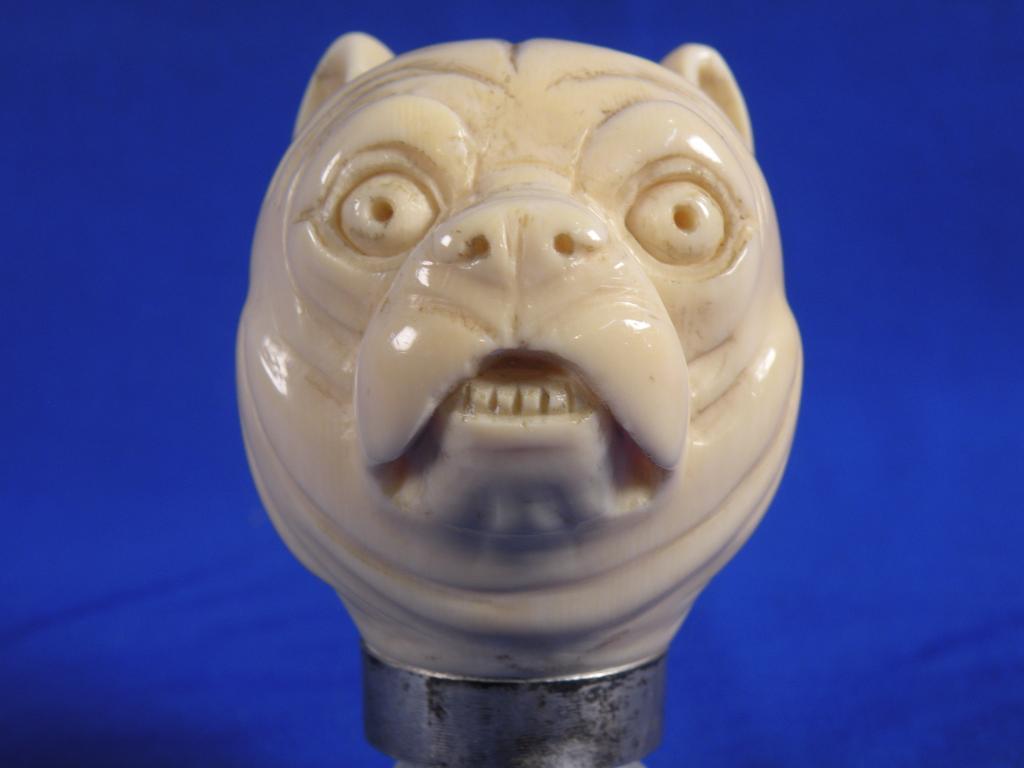 Appraisal: A late thC Continental ivory walking stick handle carved in