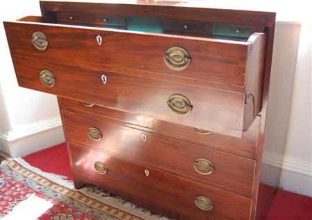 Appraisal: A George IV mahogany and inlaid secretaire chest of four