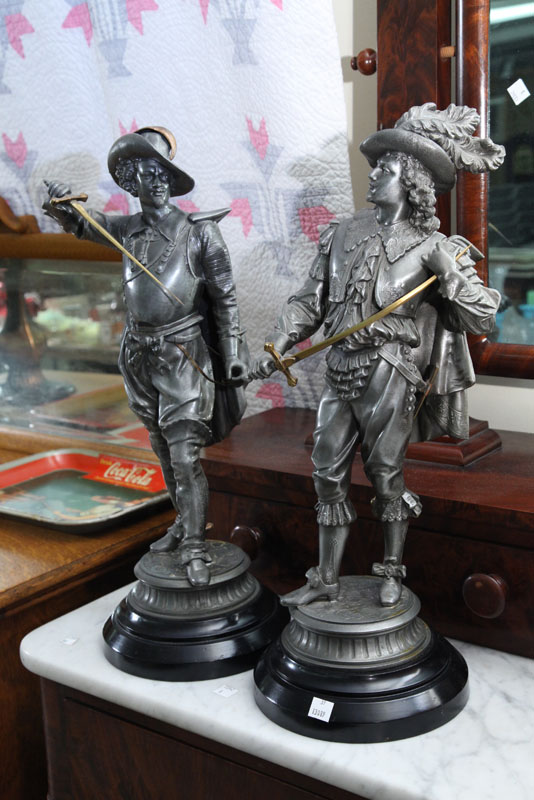 Appraisal: TWO MUSKETEER STATUES Spelter and both with swords '' h