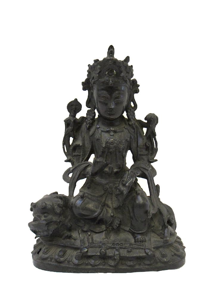 Appraisal: Bronze Figure of Manjusri Seated on Lion The bodhisattva seated