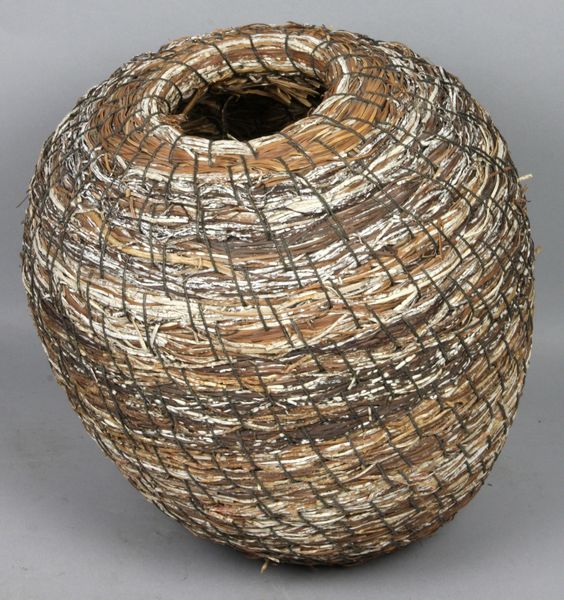 Appraisal: Woven cone-shaped basket h x diam good condition Provenance Robert