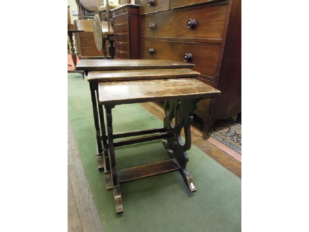 Appraisal: A nest of three reproduction oak occasional tables of rectangular