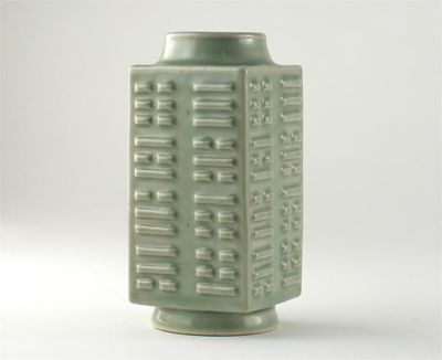 Appraisal: A Chinese celadon cong moulded with the eight trigrams on