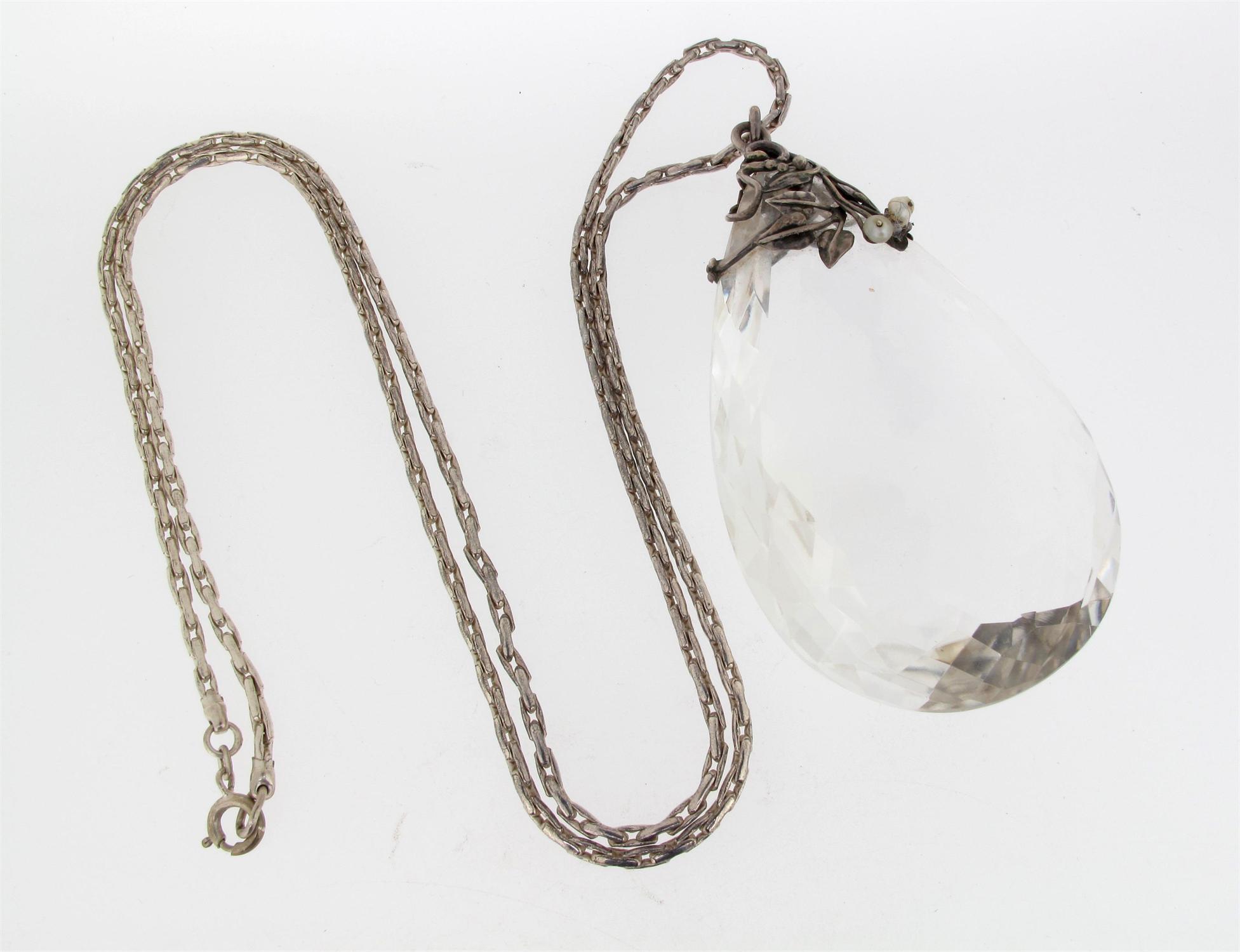 Appraisal: A large Arts and Crafts pear shaped rock crystal pendant