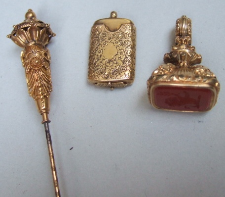 Appraisal: A Victorian cornelian set pendant fob seal decorated with grapes