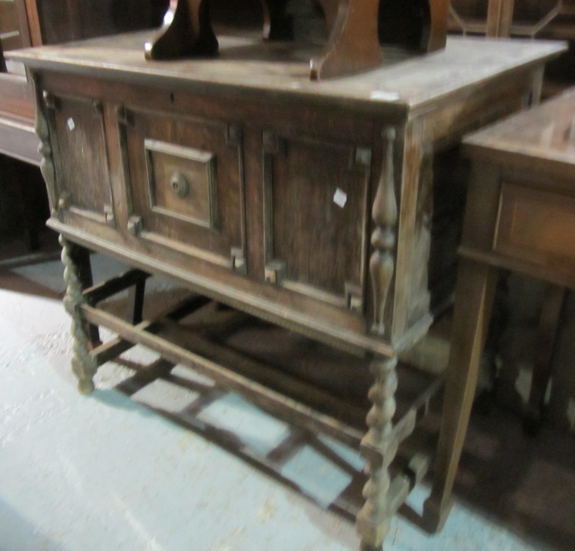 Appraisal: An oak lift top trunk on stand