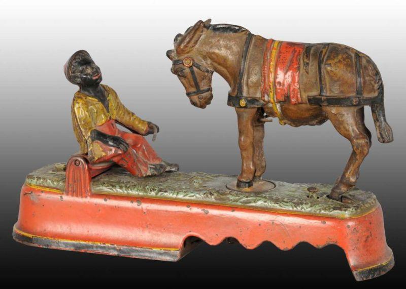 Appraisal: Cast Iron Spise a Mule Mechanical Bank Description Manufactured by