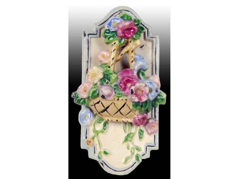 Appraisal: Mixed Flowers in Basket Cast Iron Doorknocker Description '' x