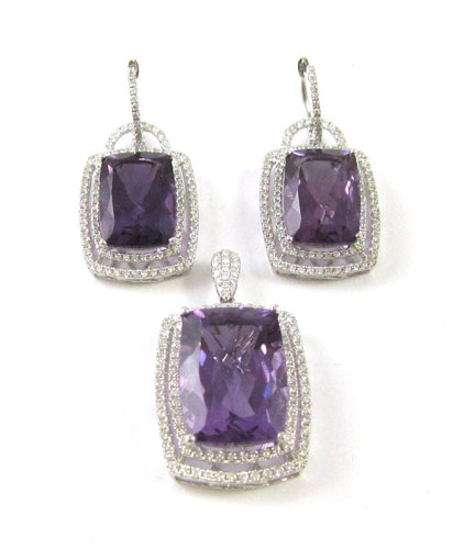 Appraisal: AMETHYST AND DIAMOND EARRINGS AND PENDANT SET with a pair