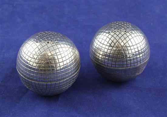 Appraisal: A pair of Victorian novelty silver pepperettes modelled as gutta