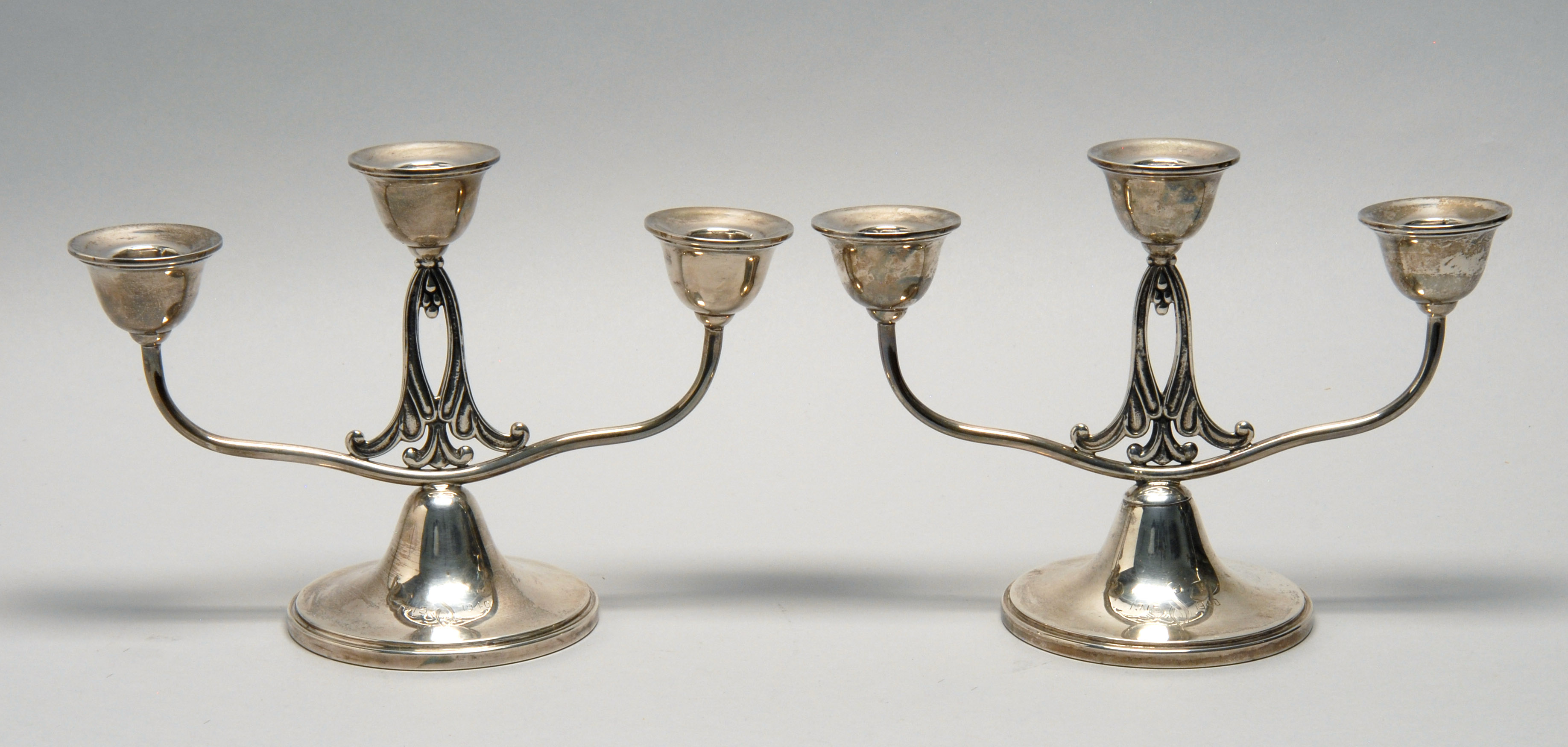 Appraisal: PAIR OF RANDAHL STERLING SILVER THREE-LIGHT CANDELABRA Illinois Circa In