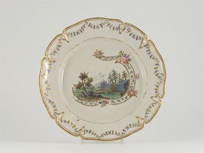 Appraisal: A moulded Nymphenberg plate the centre painted with a landscape