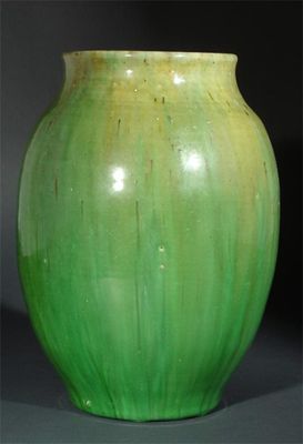 Appraisal: A Coldrum stoneware vase designed by Reginald Wells covered in