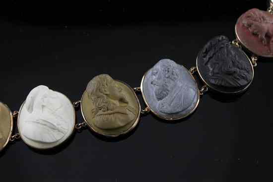 Appraisal: An Italian gold mounted lava cameo bracelet carved with heads