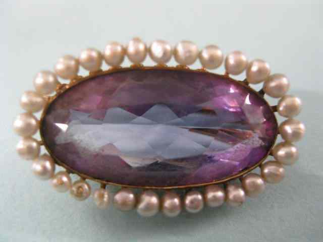 Appraisal: Amethyst Pearl Brooch fine carat oval gem surrounded by seed