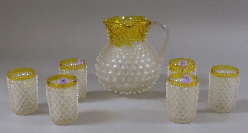 Appraisal: Seven-piece Franciscan Yellow and Frosted Colorless Art Glass Beverage Set