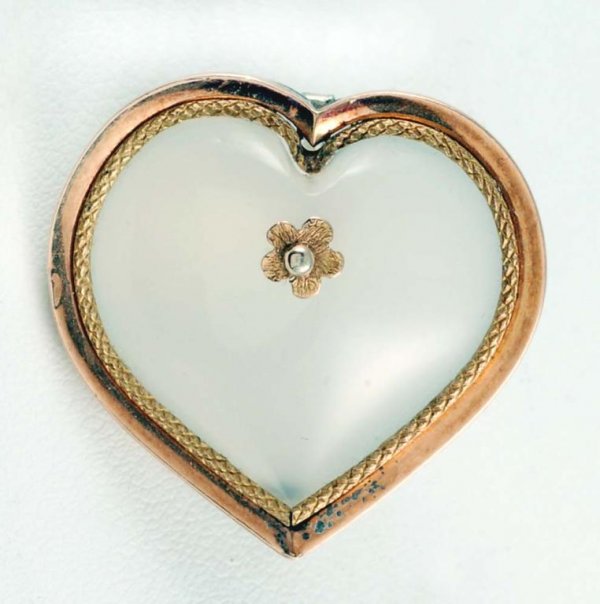 Appraisal: Chalcedony and gold pin Heart shaped glass with gold frame