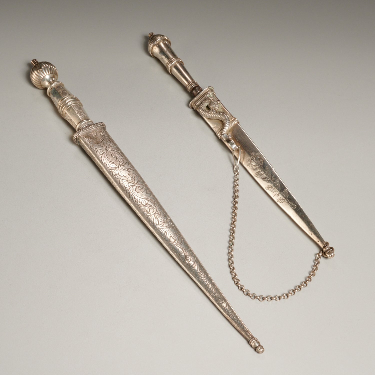 Appraisal: ANTIQUE ARGENTINE SILVER DAGGERS th th c each with engraved