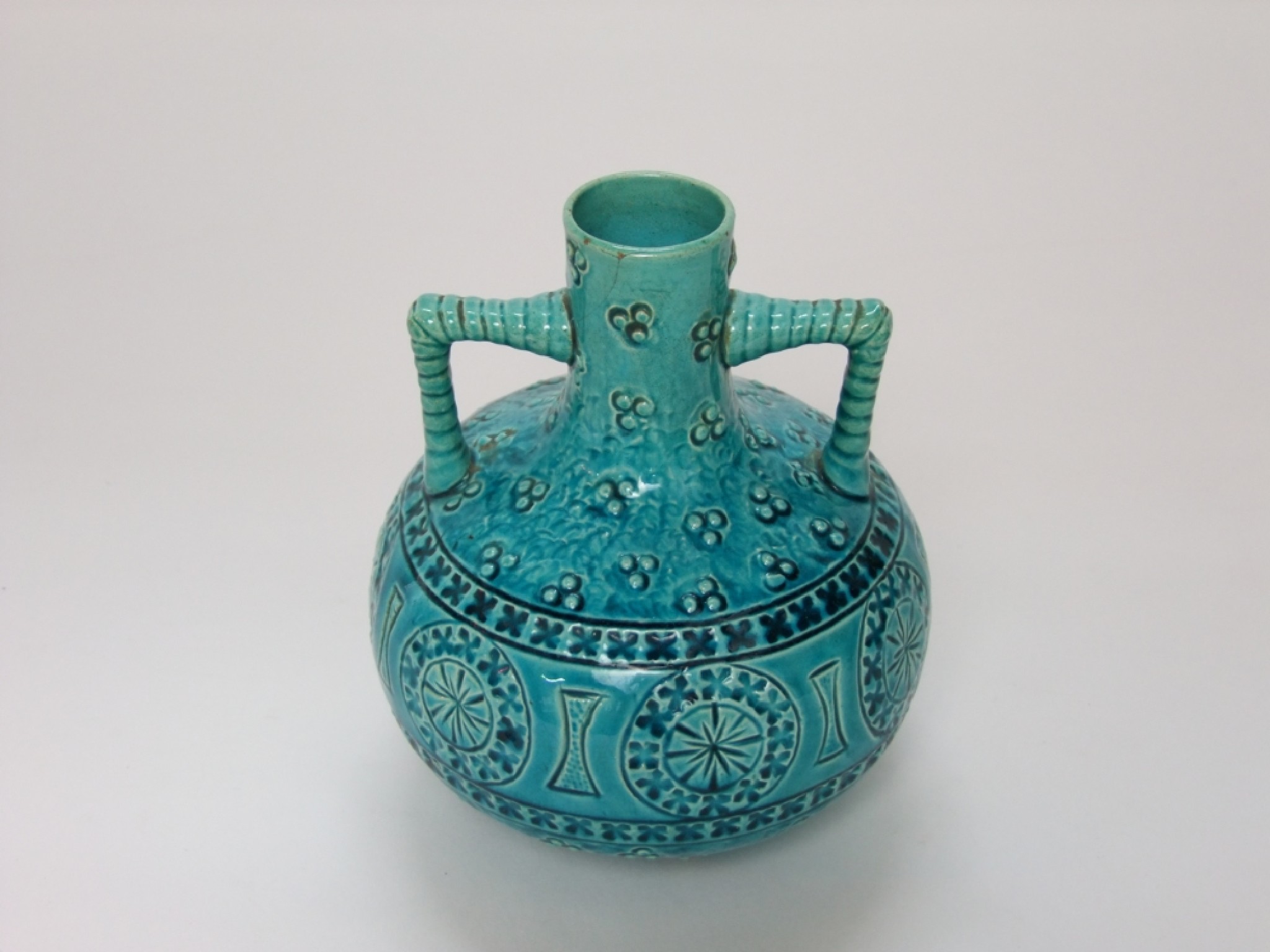 Appraisal: A late th century Burmantofts Faience turquoise glazed two handled