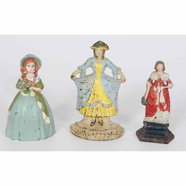 Appraisal: Victorian Women Doorstop American a cast iron and painted Victorian