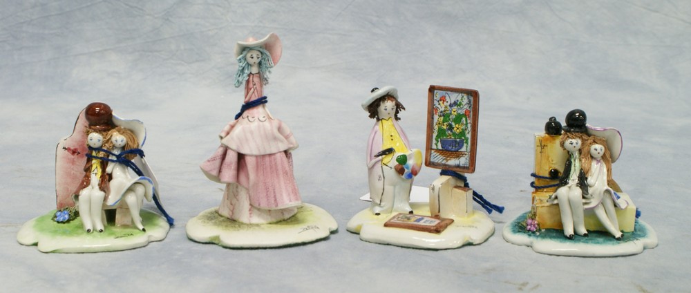 Appraisal: Zanpiva figurines street artist southern belle couples tallest