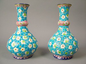 Appraisal: A pair of Longwy pottery bottle vases circa early th